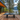 A_photo_of_an_outdoor_wooden_deck_with_a_table_tennis