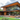 A_modern_wood_and_steel_home_with_a_large_balcony