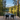An_outdoor_deck_with_black_and_white_cables_overlooking a lake